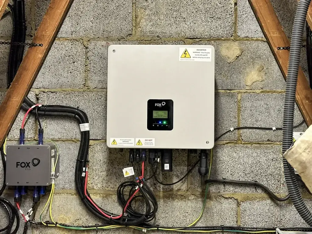 Fox ESS solar inverter and electrical connections installed in a loft